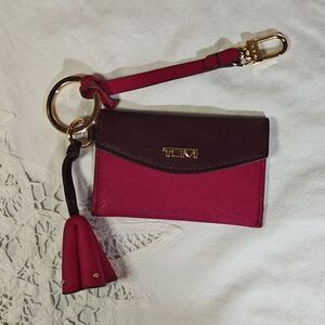 TUMI Fuchsia Magnetic Card Holder with Keychain and Tassel